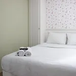 Cozy Studio Apartment At Grand Asia Afrika By Travelio