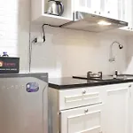 Cozy Studio Apartment At Grand Asia Afrika By Travelio