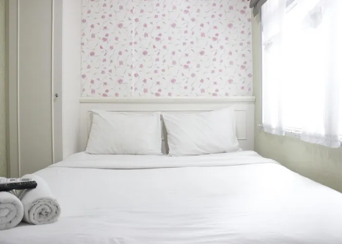 Cozy Studio Apartment At Grand Asia Afrika By Travelio