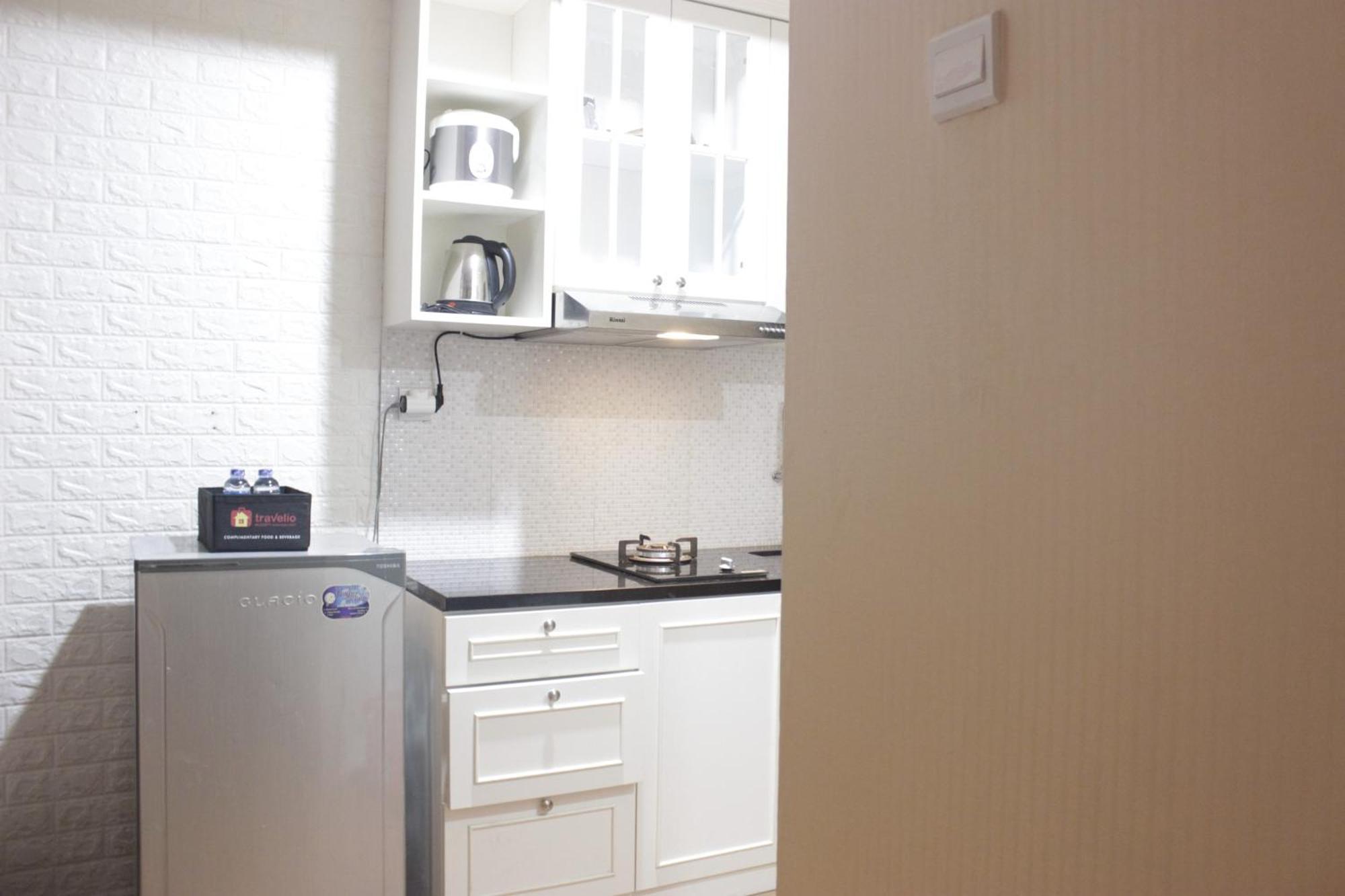 Apartemen Cozy At Grand Afrika By Travelio